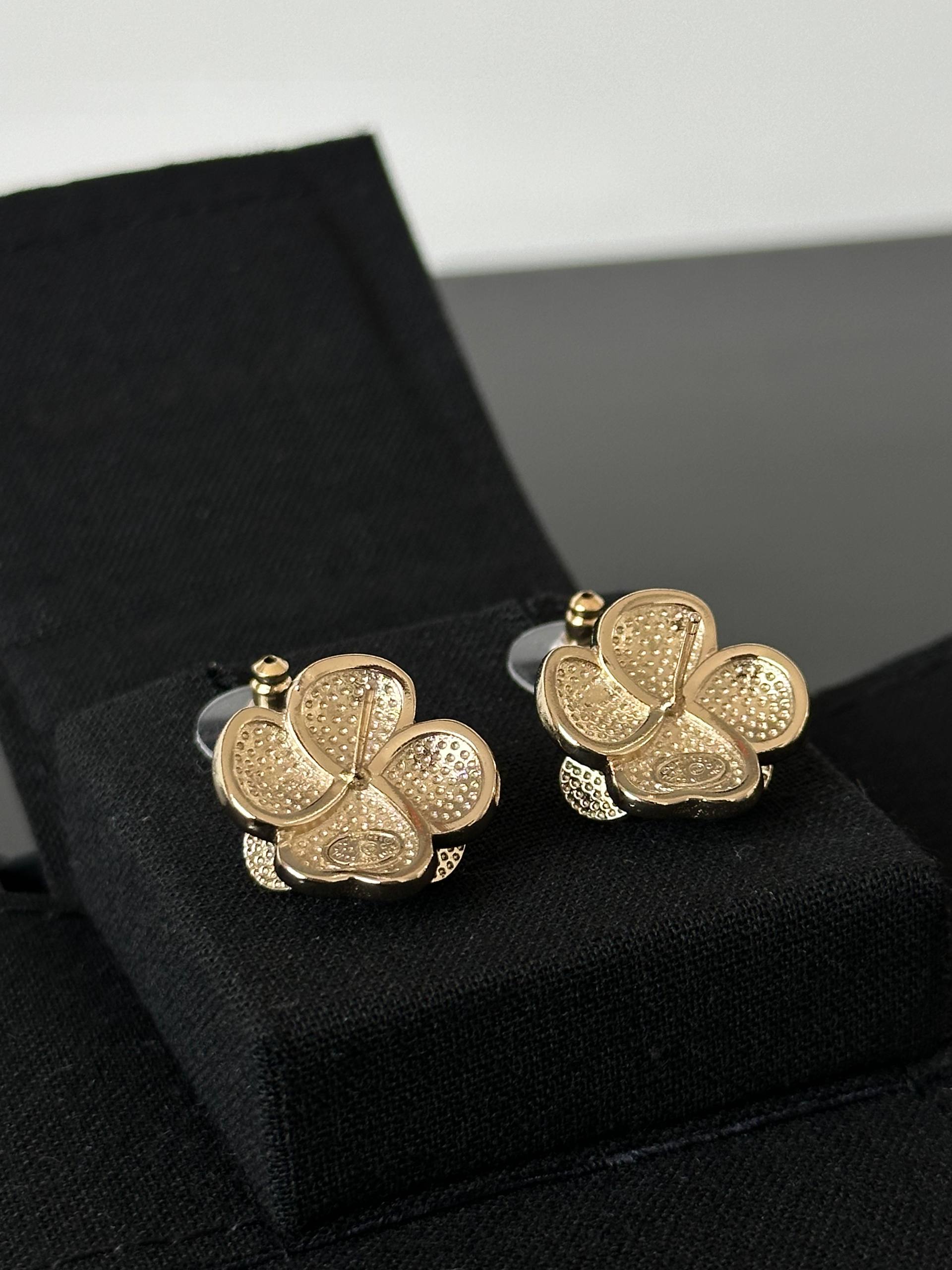 Chanel Black Gold Camellia Stud Earrings