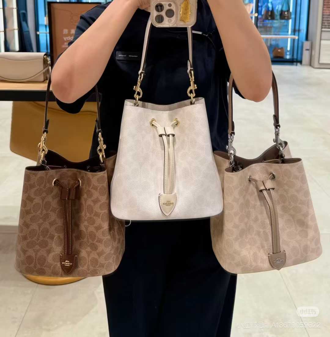 Women Handbag CEL14 CDY21 CBH06 CBH07 CDA92 CEA23 ROWAN BUCKET BAG IN PRETTY SIGNATURE CANVAS