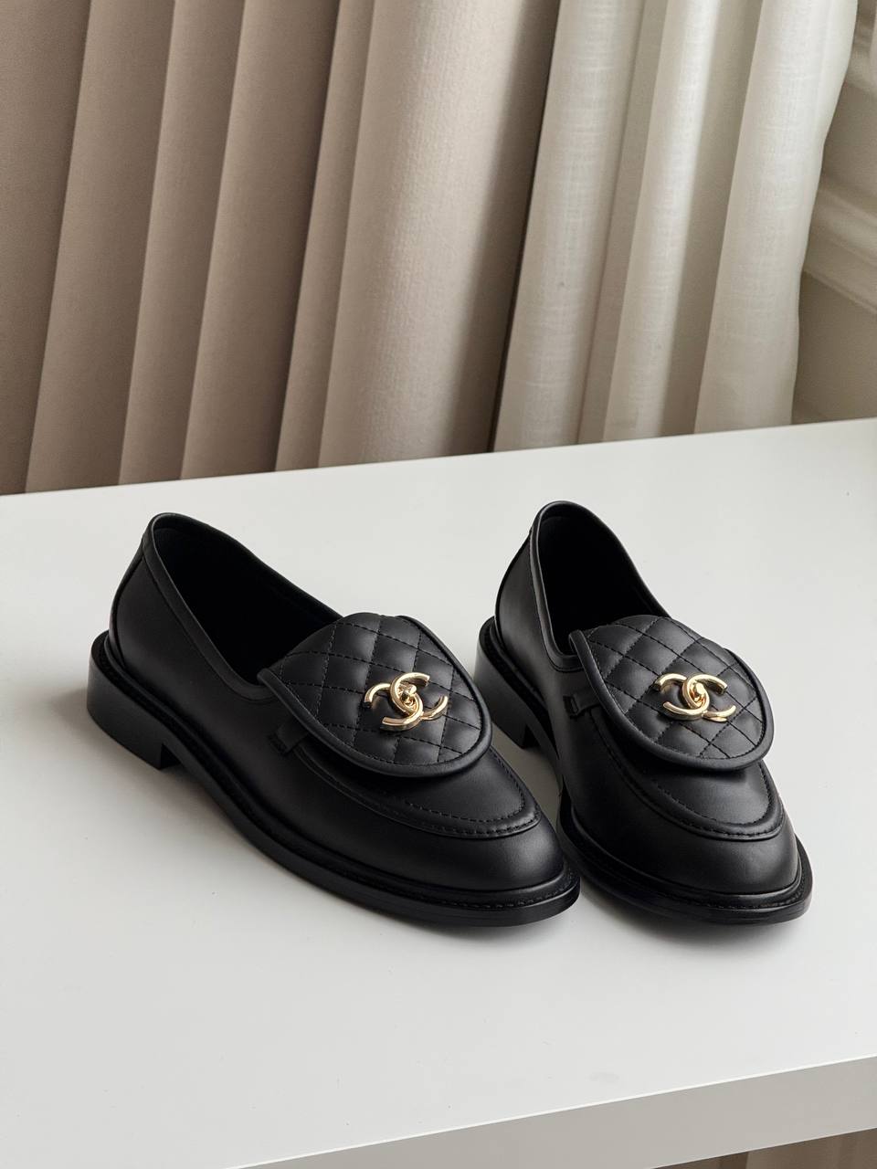 CHANEL Quilted CC Turnlock Loafers