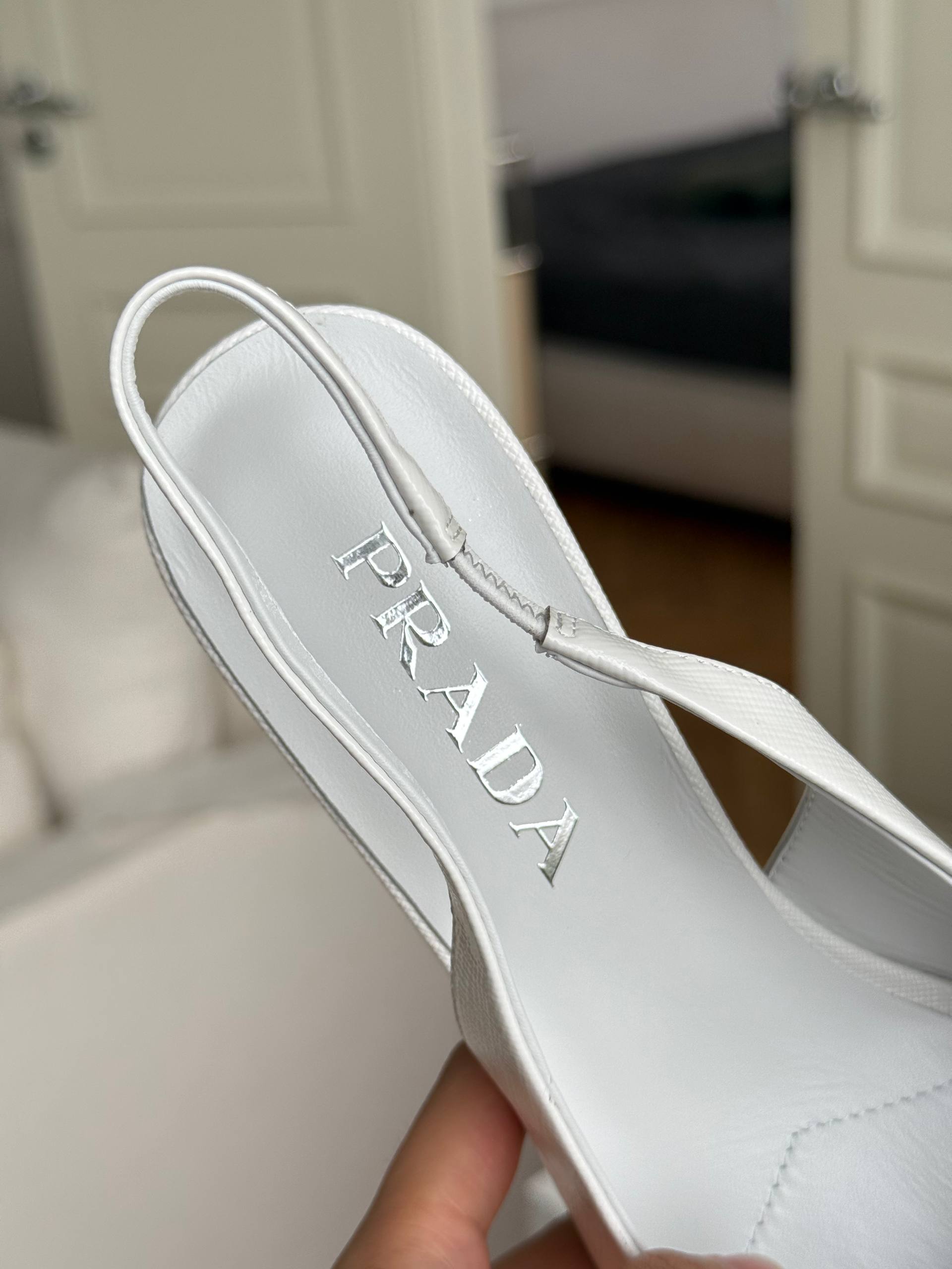 Prada Pointed-Toe Slingback Pumps with Triangle Logo