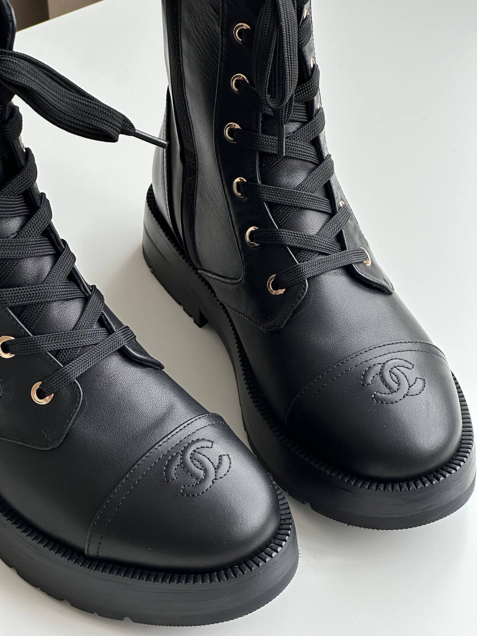 Chanel CC Embossed Leather Lace-Up Combat Boots