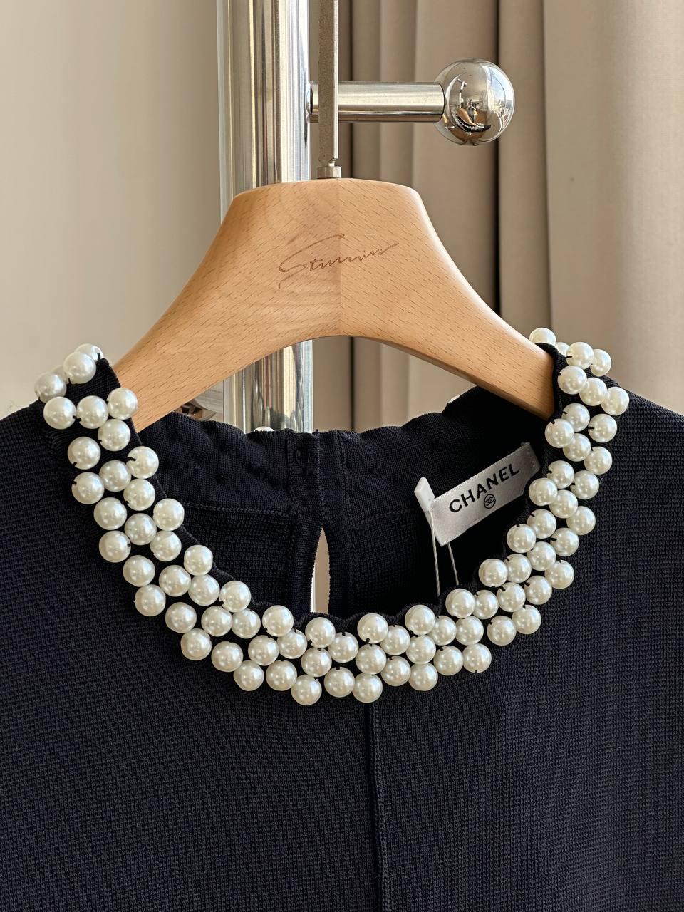 CHANEL Sleeveless Knit Dress with Pearl Neckline and Ruffled Hem