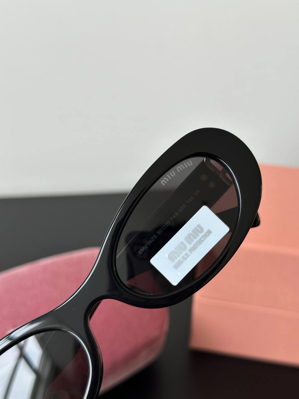 Miu Miu Black Oval Retro Sunglasses