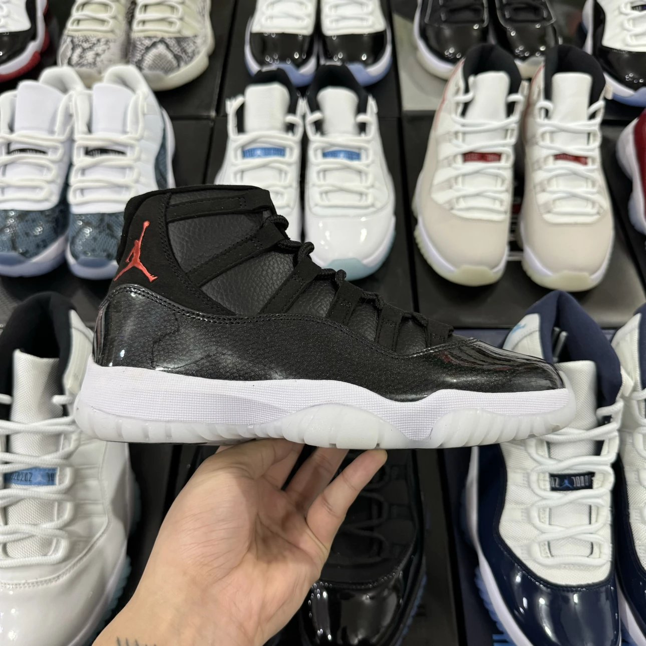 Air Jordan 11 Retro High Black Leather with Red Logo