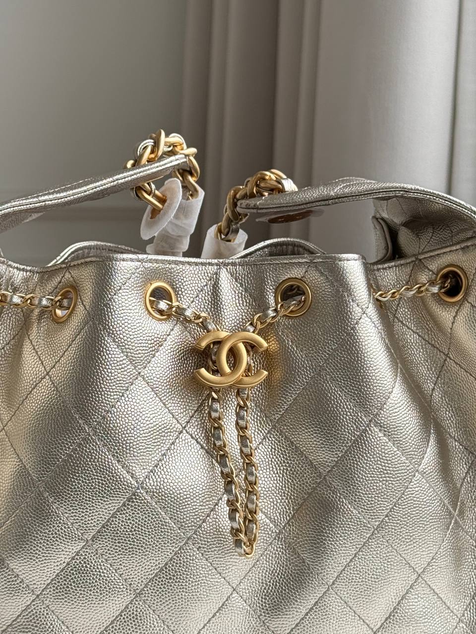 Chanel 25 Metallic Caviar Quilted Drawstring Bucket Bag