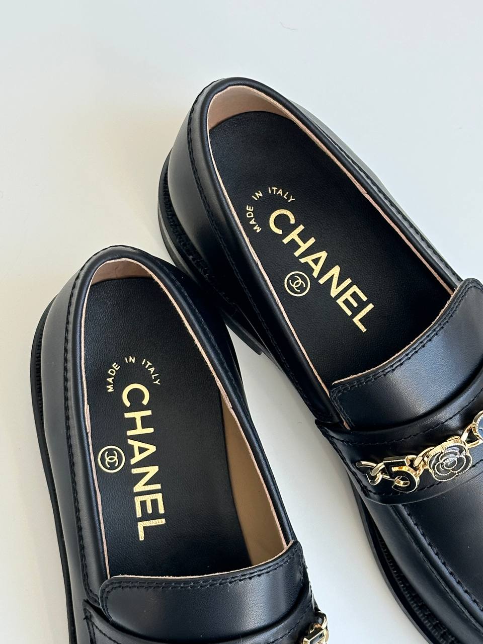 Chanel Black Smooth Calfskin Heart Camellia Interlocking CC Metal Chain Low Heel Loafers