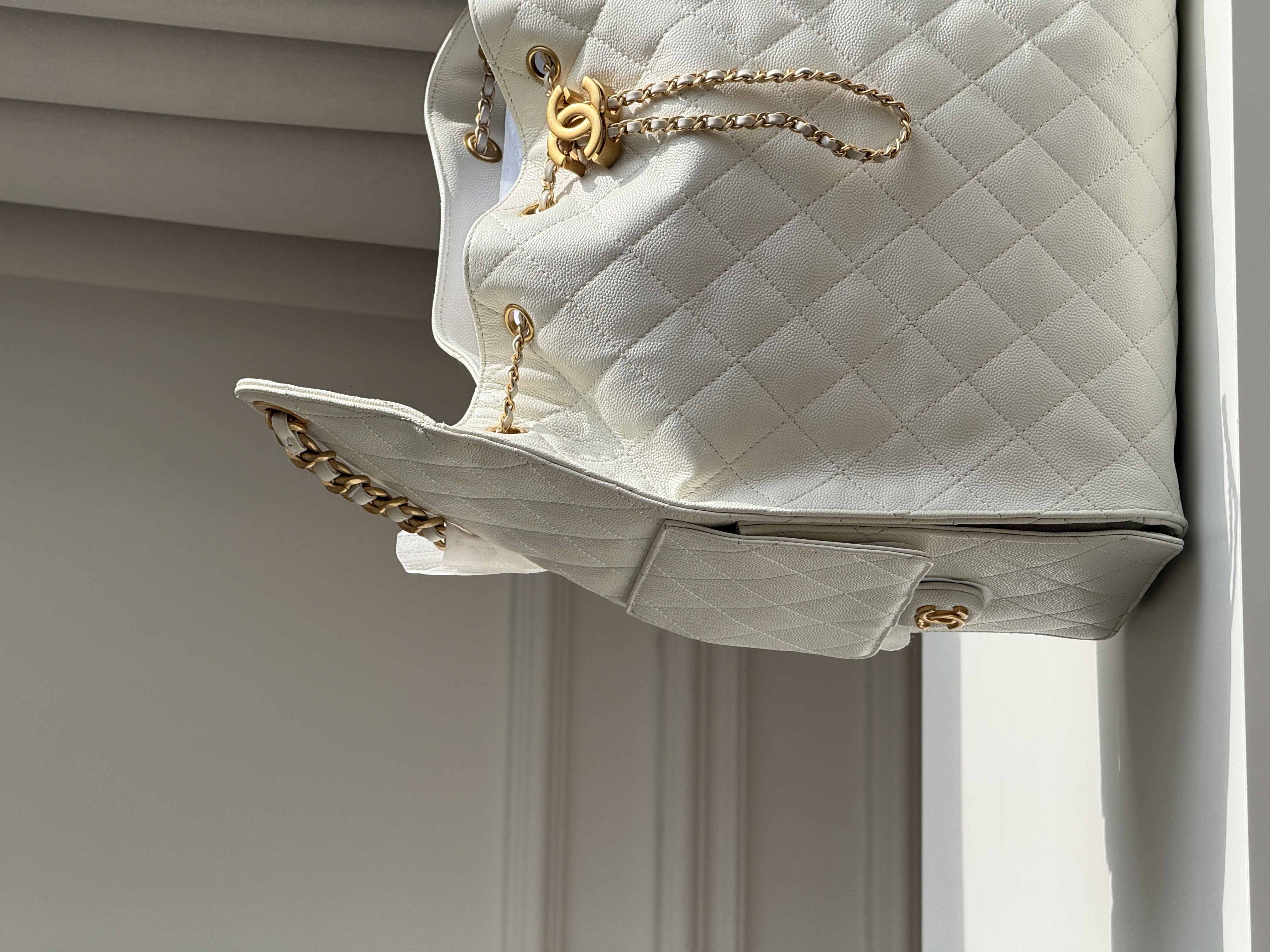 CHANEL Quilted Drawstring Bucket Bag in Milky White