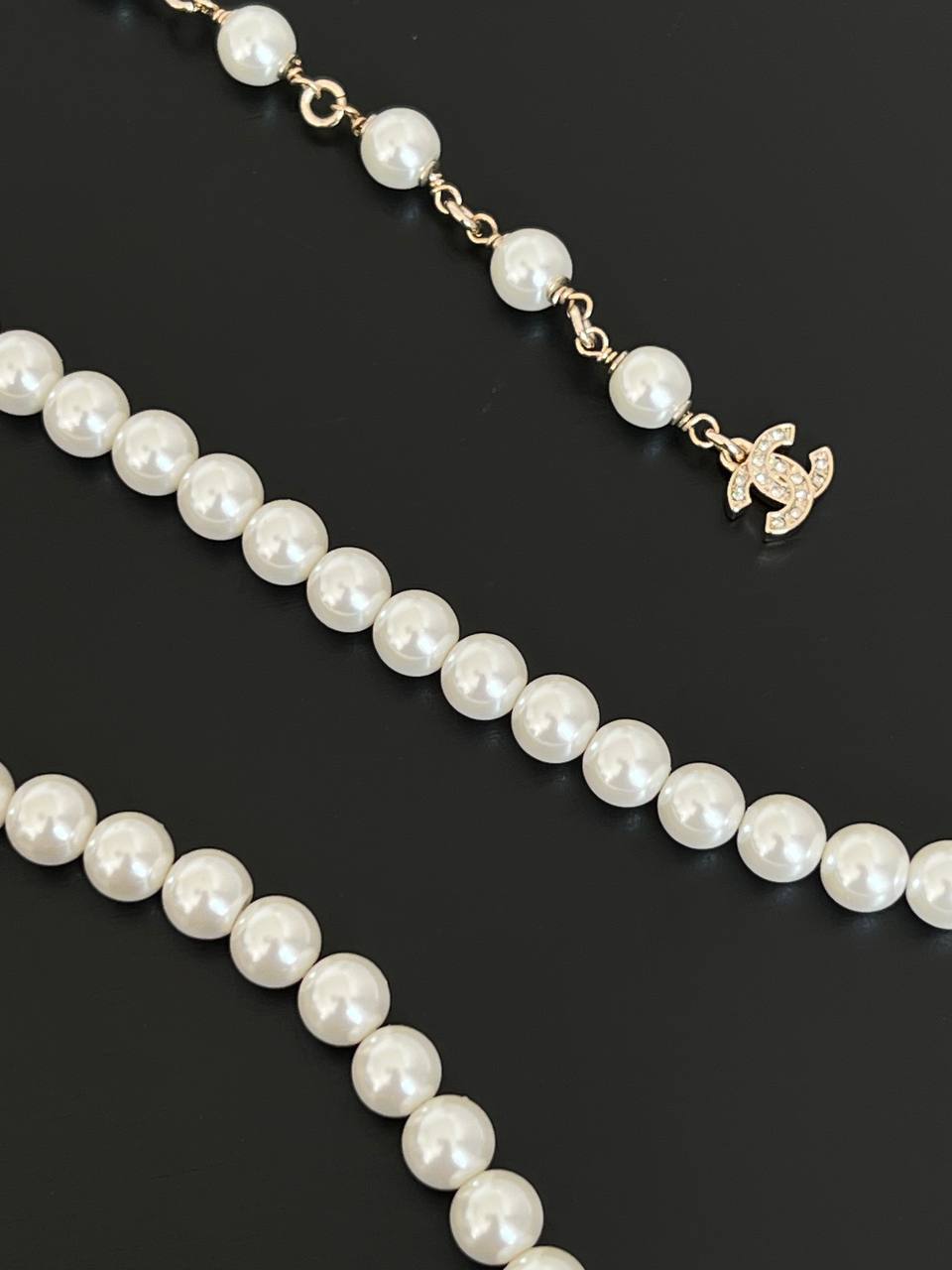Chanel White Pearl Long Necklace With Crystal Encrusted Letter Logo