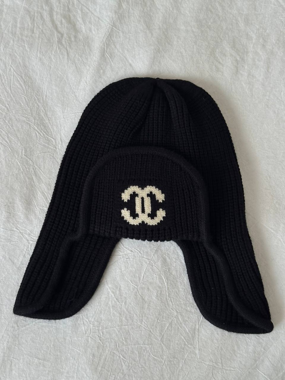 Chanel Black Vertical Rib Knit Ear Flap Hat With Off-white Jacquard CC Logo