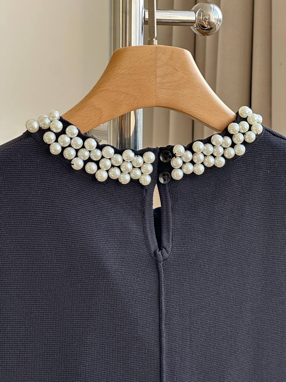 CHANEL Sleeveless Knit Dress with Pearl Neckline and Ruffled Hem