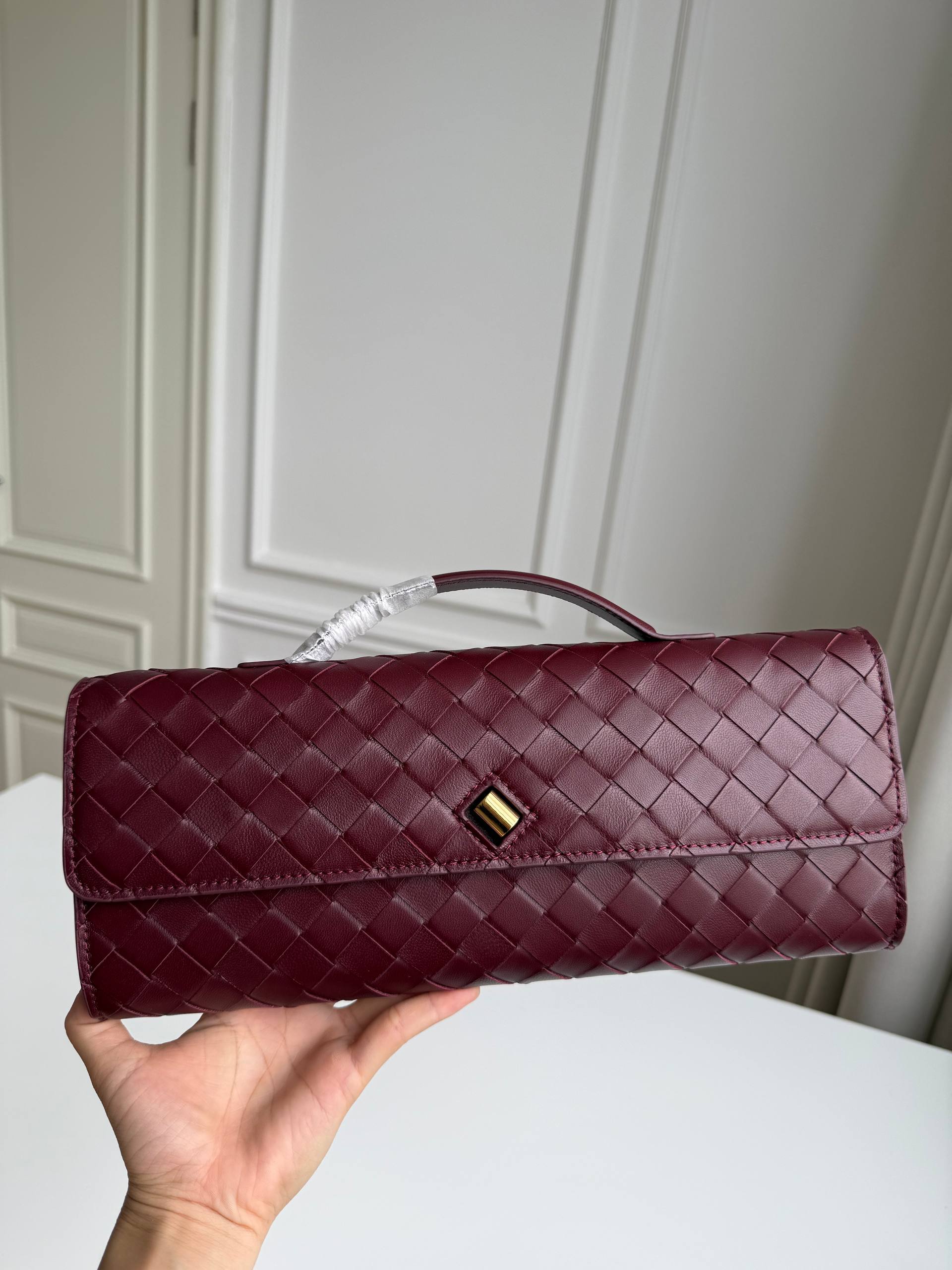 BV Andiamo Woven Leather Clutch Bag