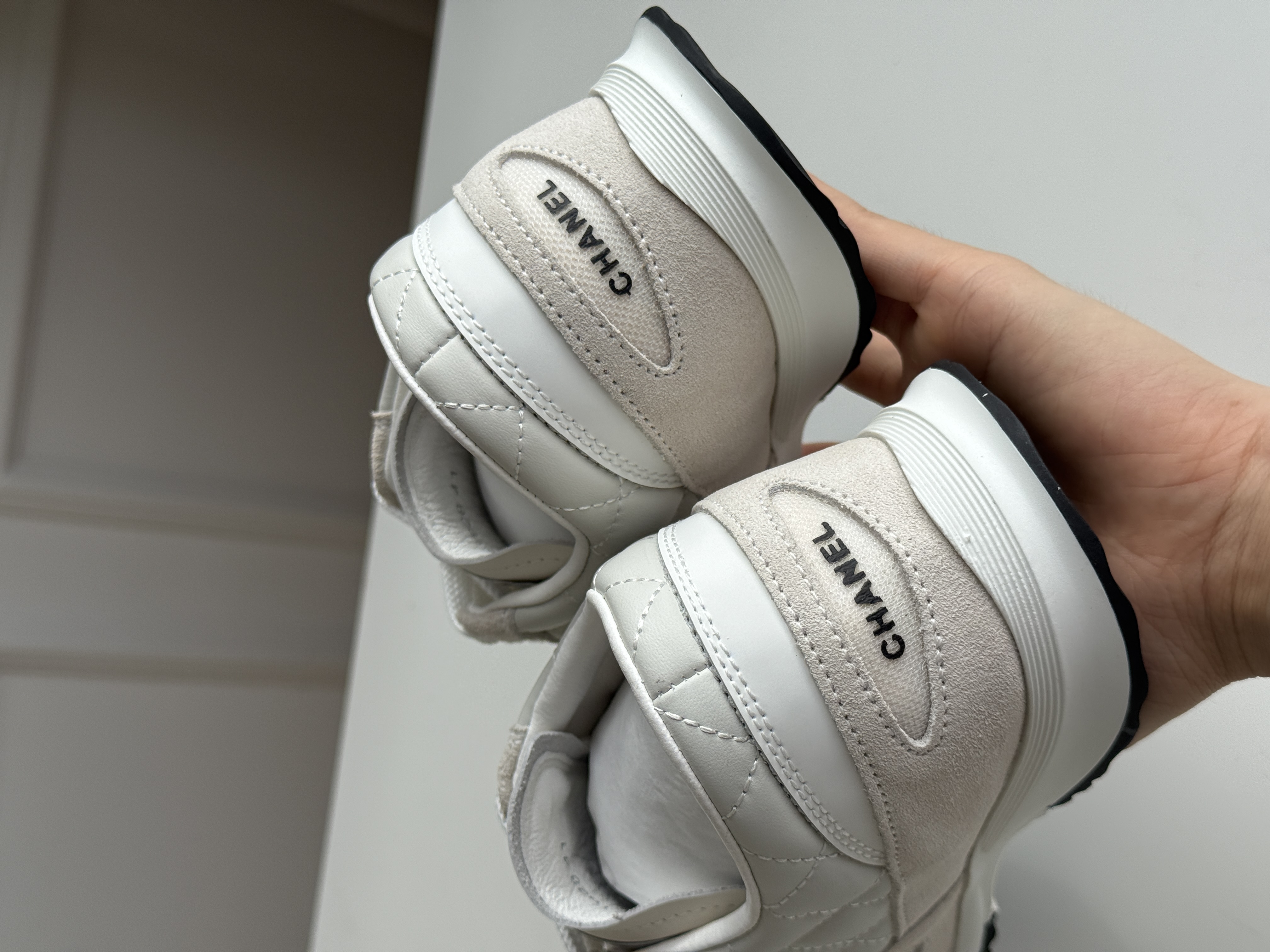 CHANEL Quilted Low-Top Sneakers