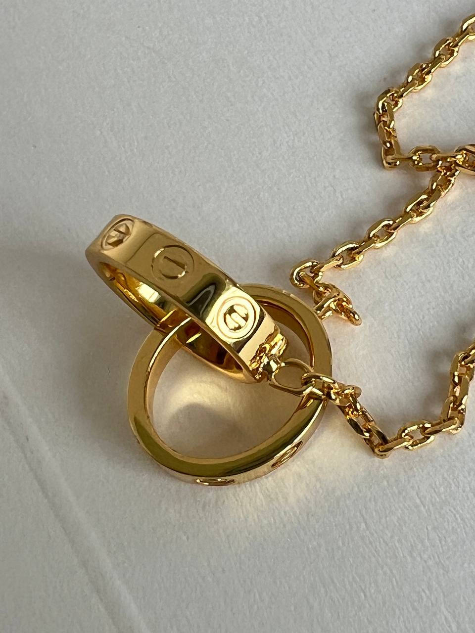 Cartier LOVE Yellow Gold Interlocking Two Rings Pendant Necklace