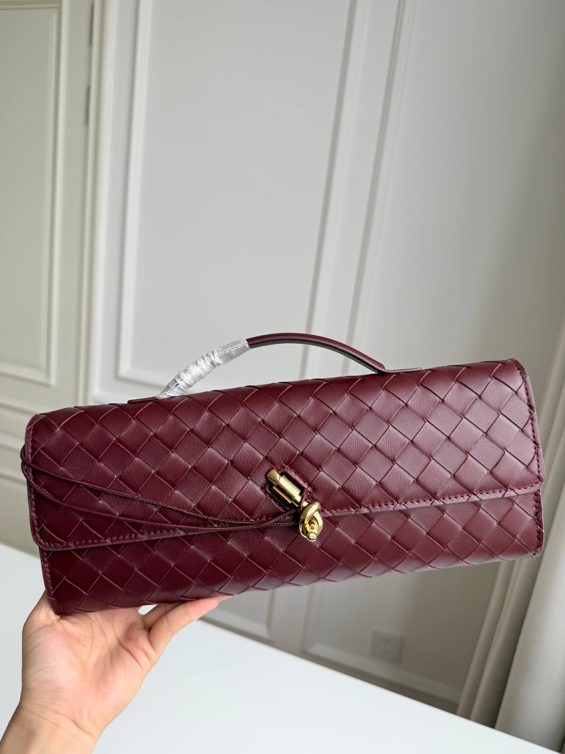 BV Andiamo Woven Leather Clutch Bag
