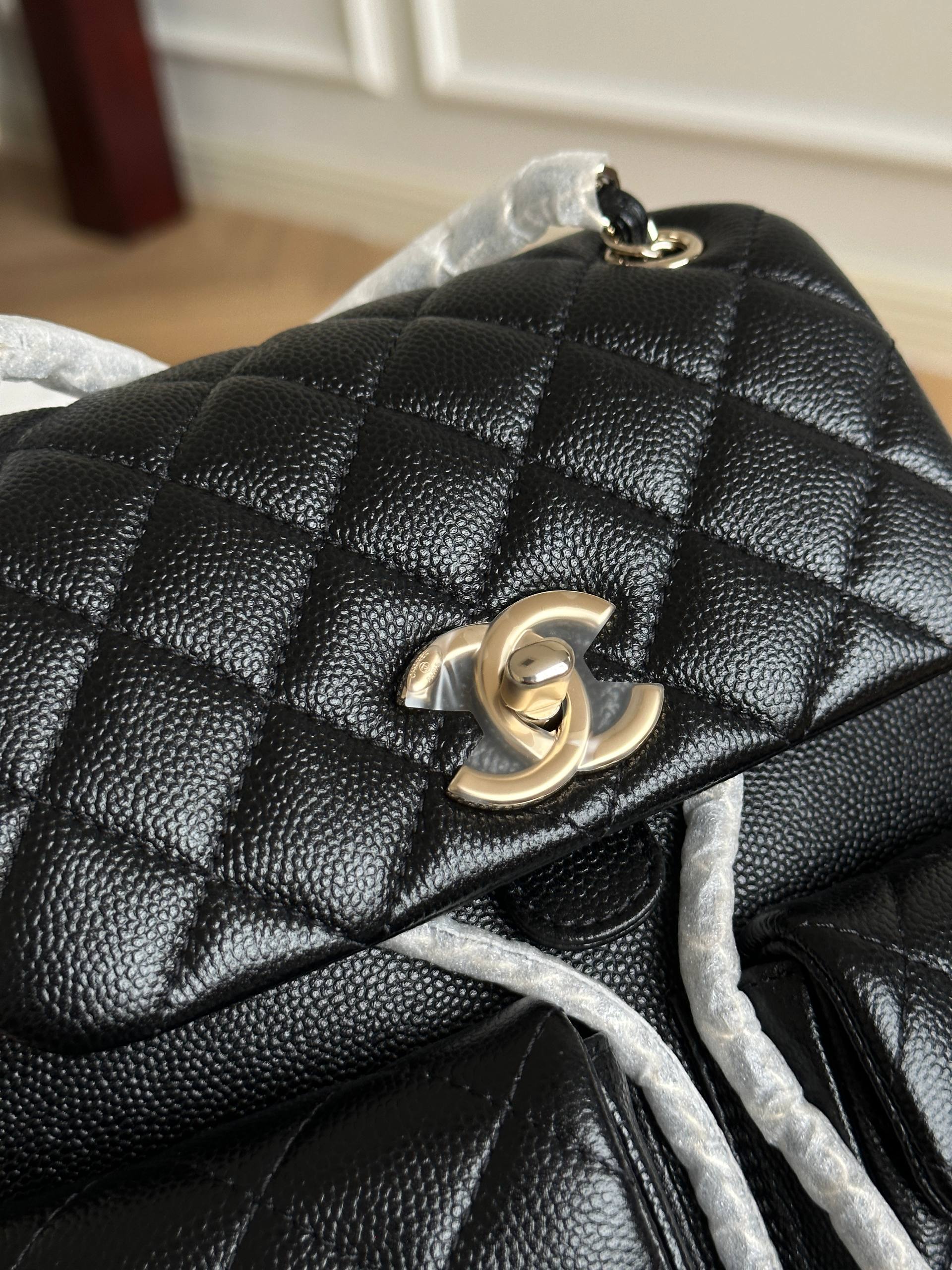 Chanel Black Caviar Quilted Double Pocket CC Drawstring Chain Mini Backpack