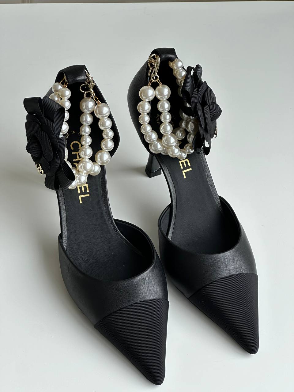Chanel Black Calfskin & Grosgrain Camellia Pearl Ankle Strap Pointed Toe Slingback Heels