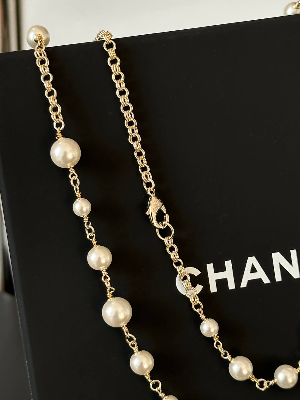 Chanel Long Necklace with Glass Pearls & CC Logos