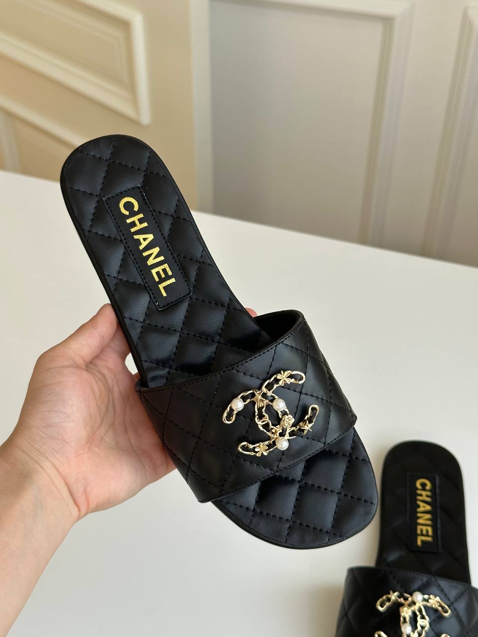 Chanel Black Quilted Lambskin Pearl Chain CC Logo Flat Slide Sandals