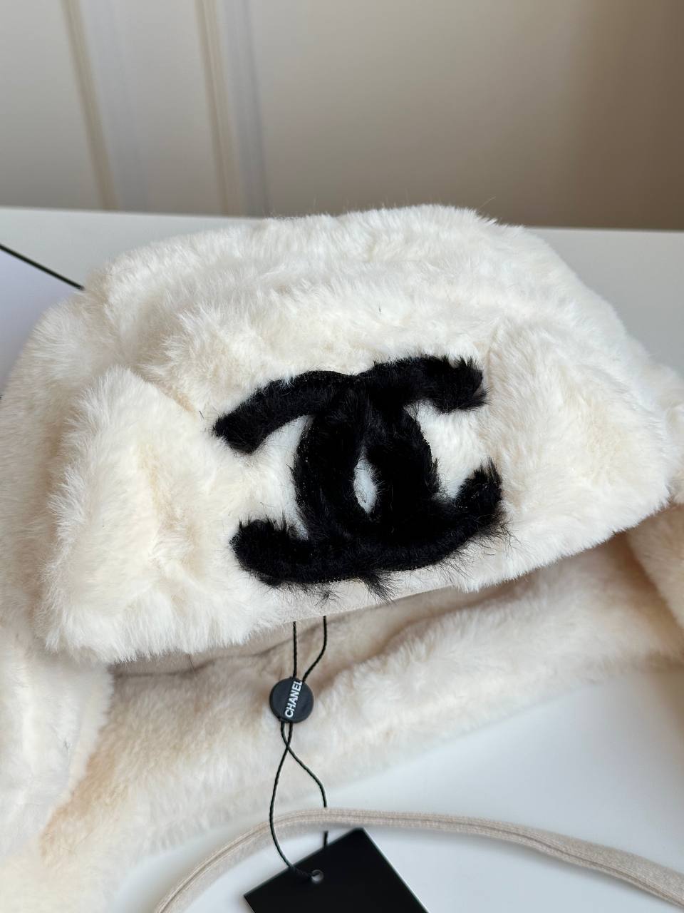 Chanel Off-White Faux Shearling Fur Embroidered CC Ear Flap Trapper Hat
