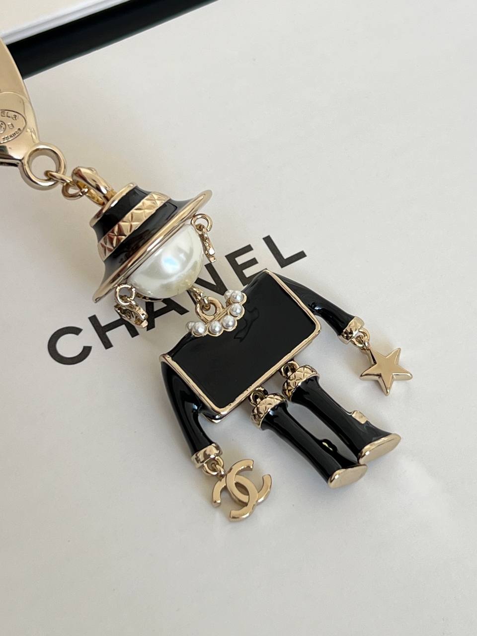 Chanel Doll Pearl Enamel Metal Keychain Bag Charm