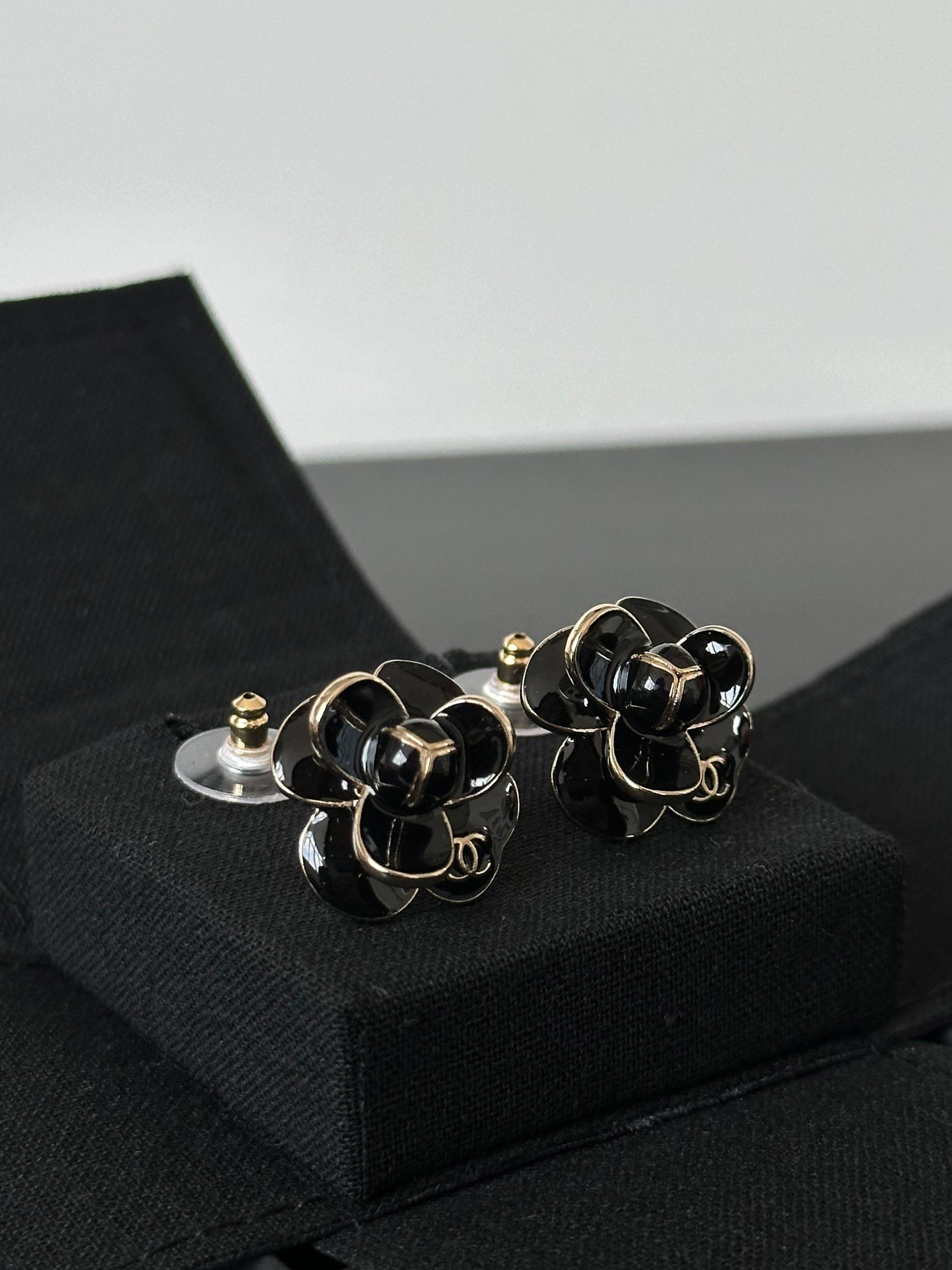 Chanel Black Gold Camellia Stud Earrings