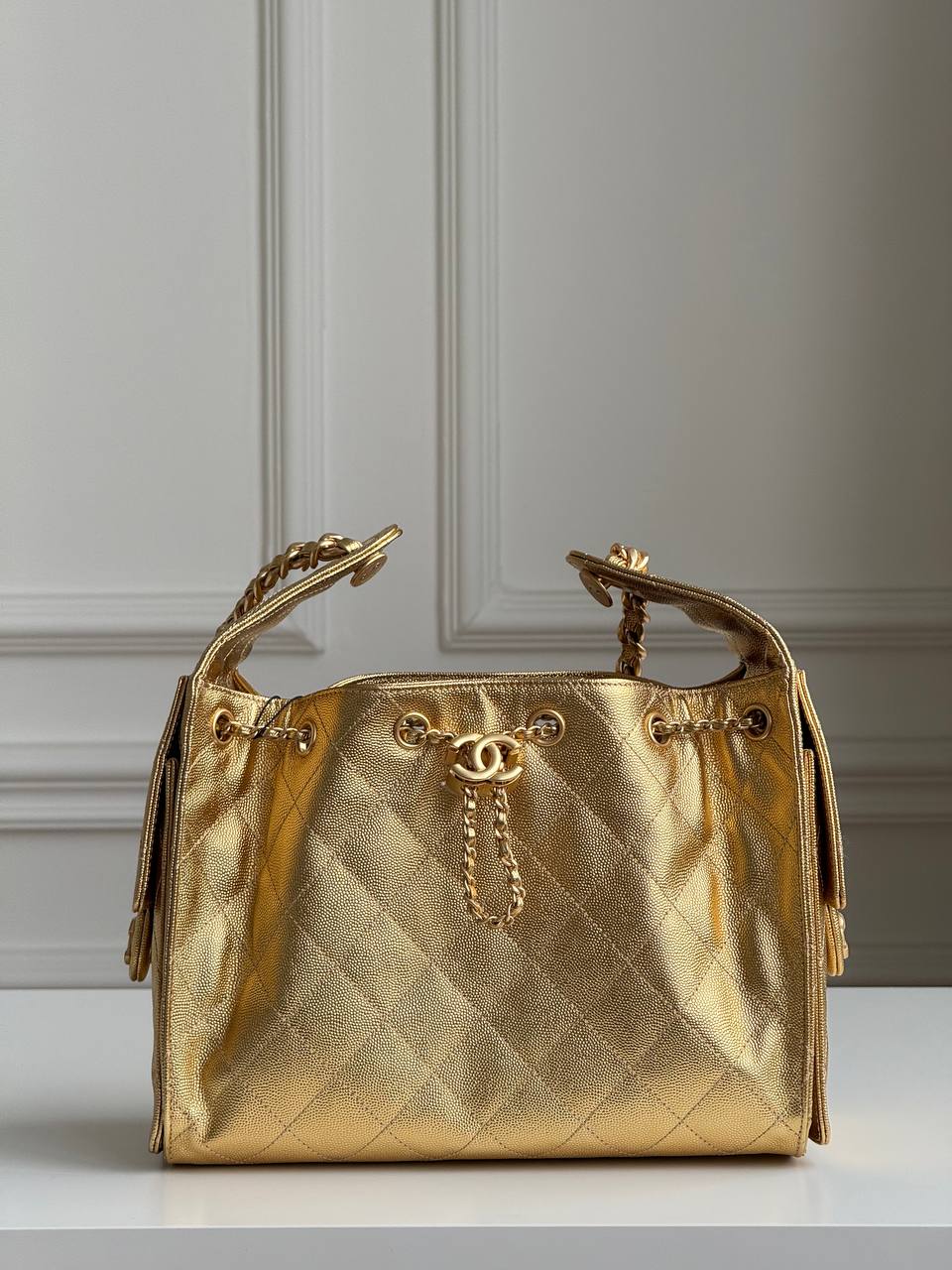 Chanel 25 Mini/Small Metallic Grained Calfskin Bucket Bag in Gold