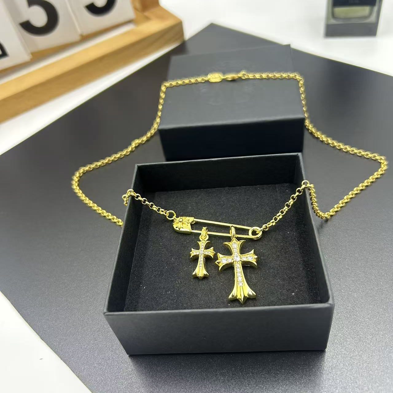 CHROME HEARTS 22K GOLD DOUBLE CROSS PENDANT NECKLACE WITH FULL DIAMOND EMBELLISHMENT
