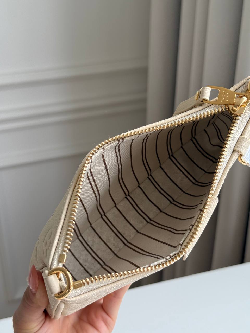 Louis Vuitton Easy Pouch On Strap in Monogram Empreinte Leather