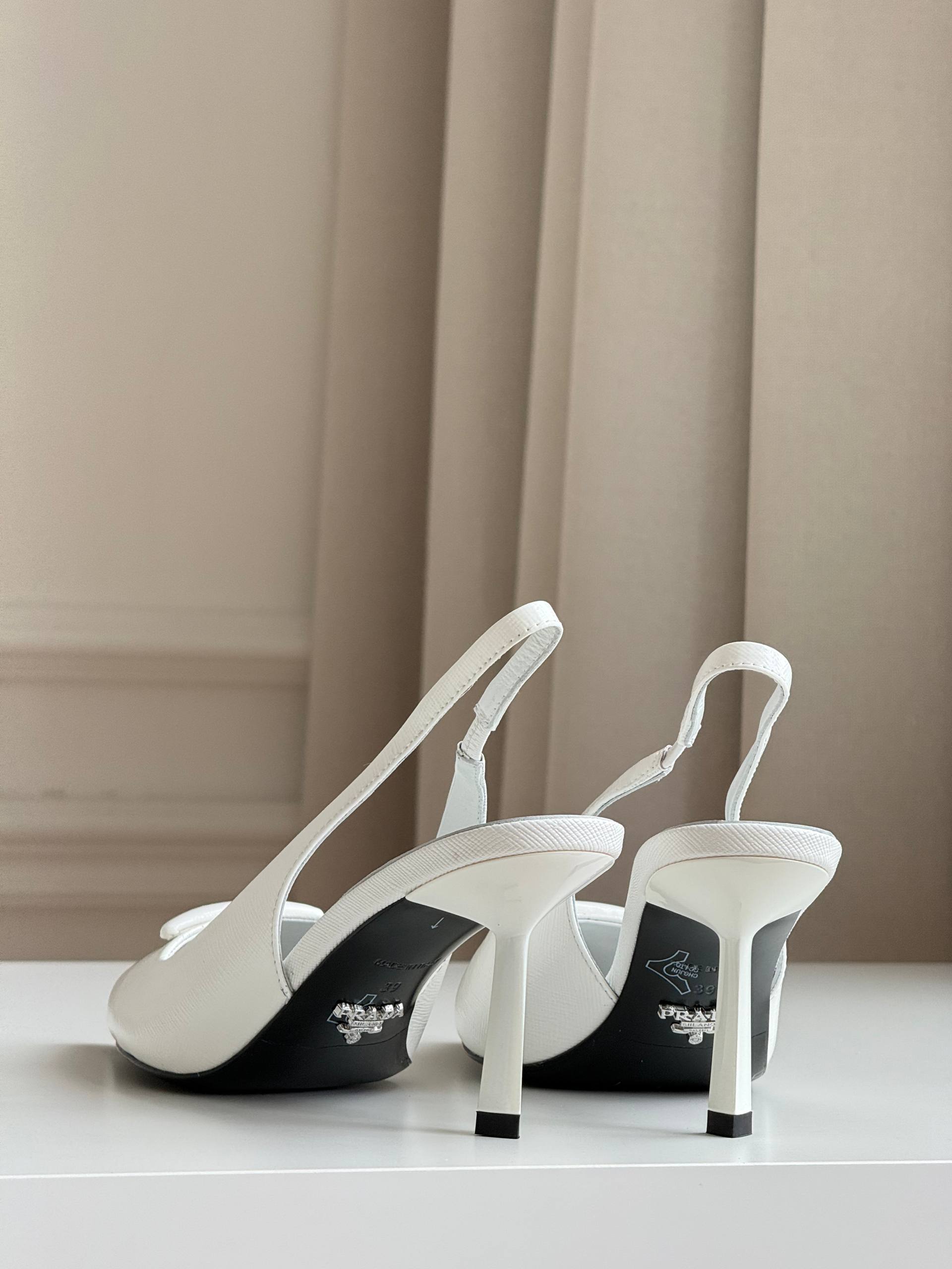 Prada Pointed-Toe Slingback Pumps with Triangle Logo