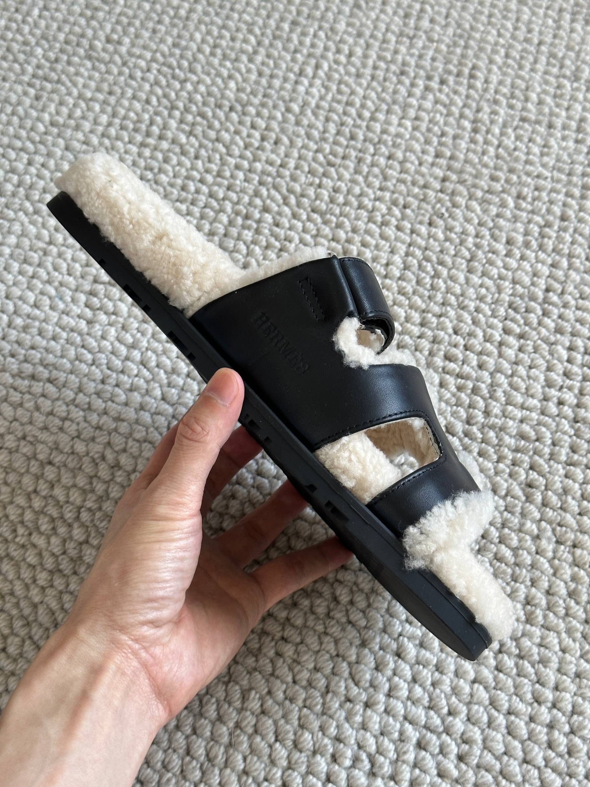 Hermès Black Calfskin & Shearling Chypre Sandals