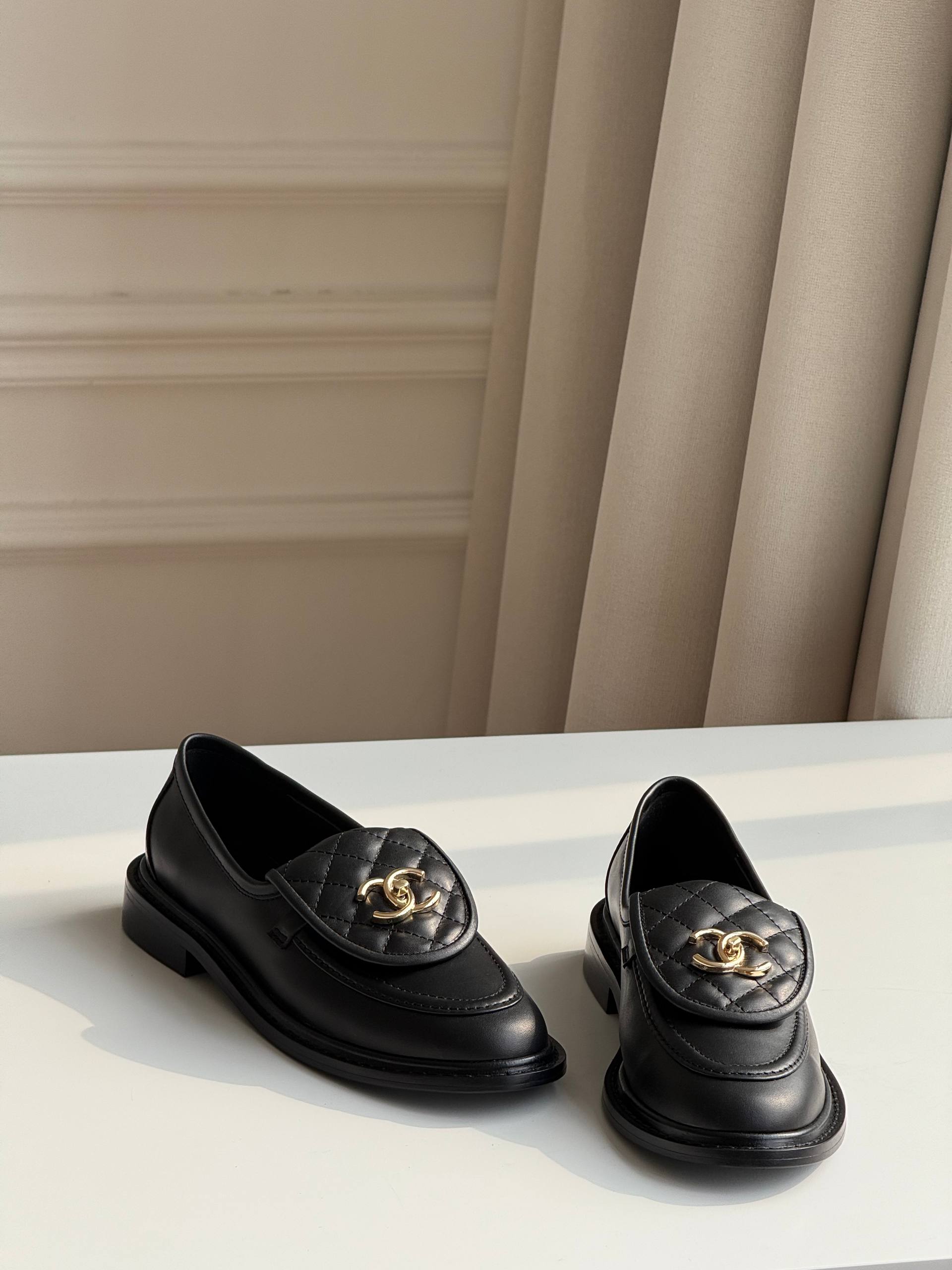 Chanel Quilted CC Turnlock Loafers