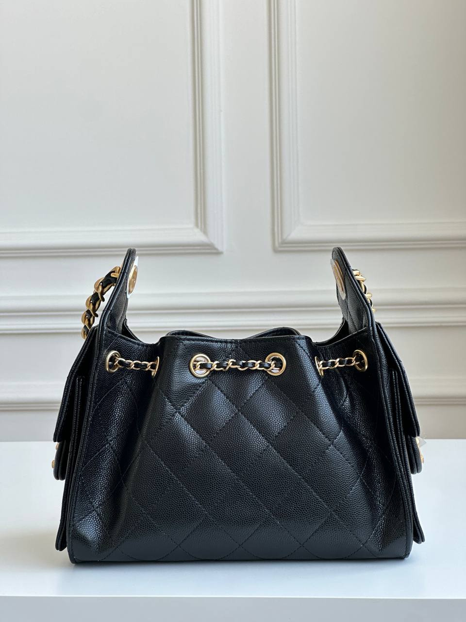CHANEL Black Caviar Quilted Drawstring Bucket Bag with CC Logo