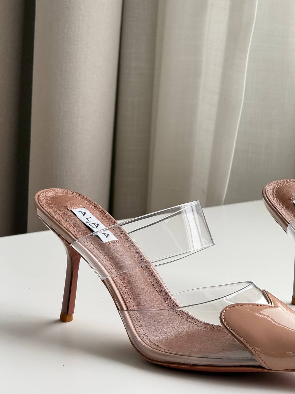 ALAÏA Heart PVC & Patent Leather Pointed-Toe Mules Nude