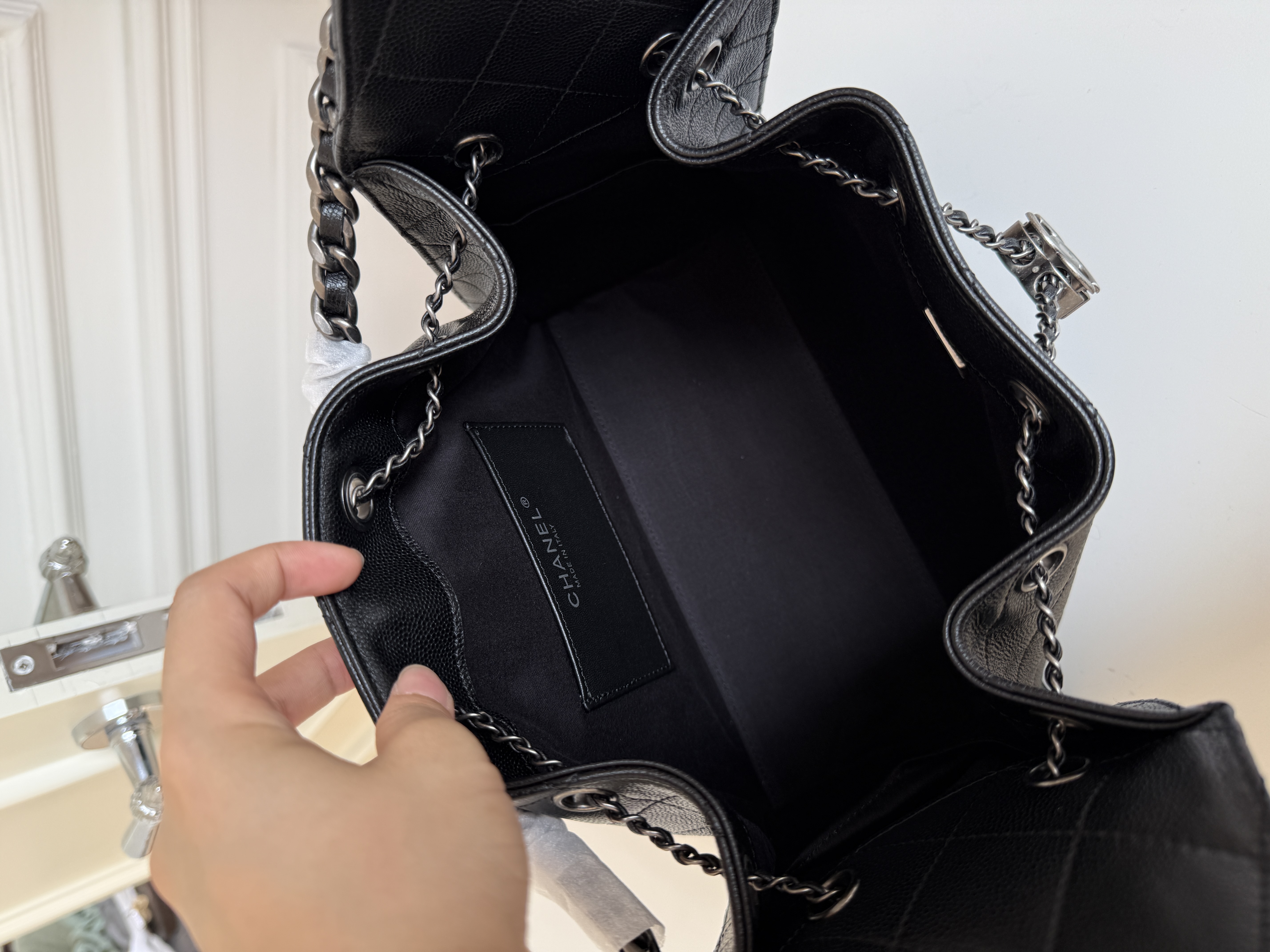 Chanel Caviar Quilted Drawstring Chain Bucket Backpack