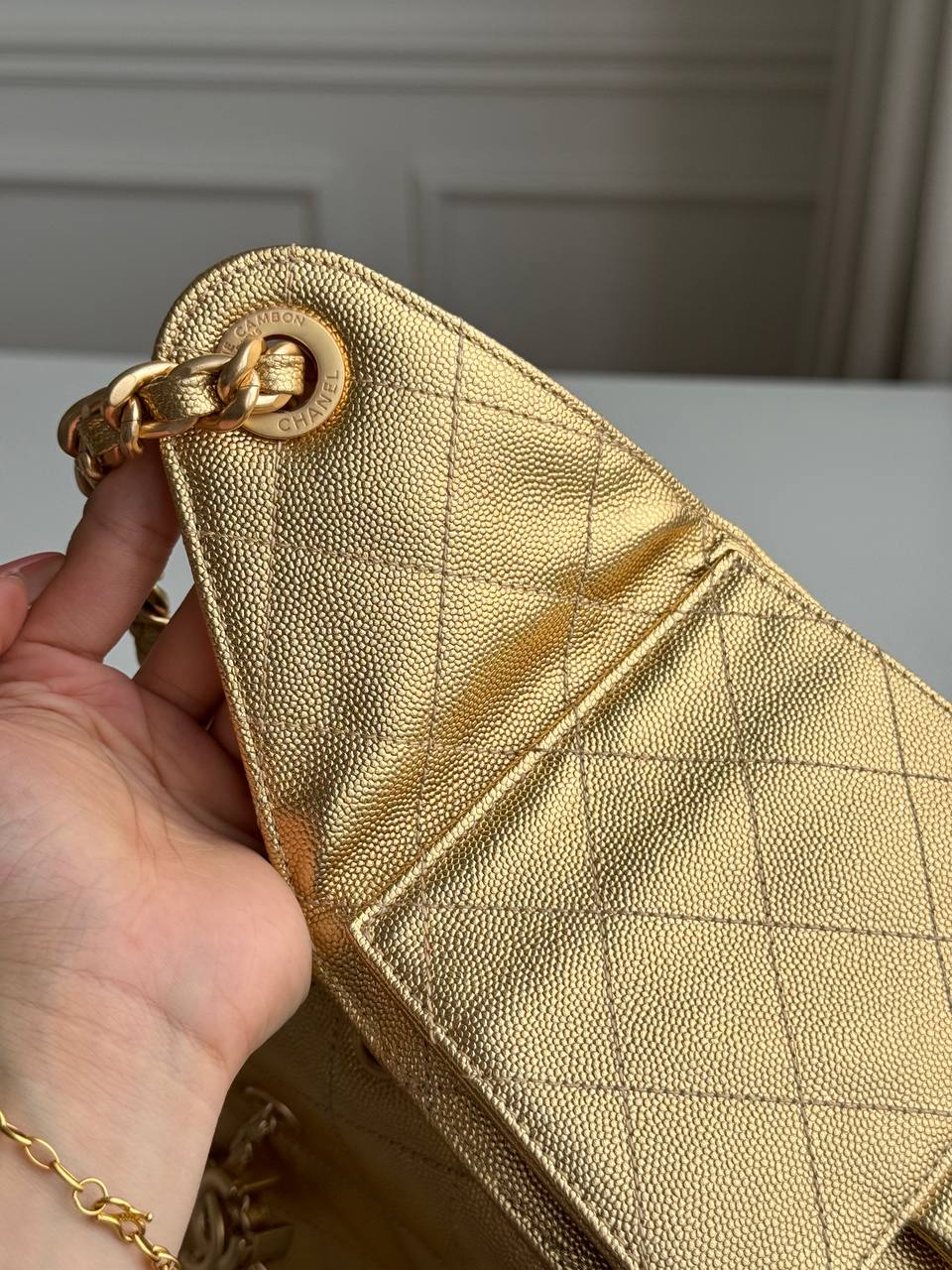 Chanel 25 Mini/Small Metallic Grained Calfskin Bucket Bag in Gold