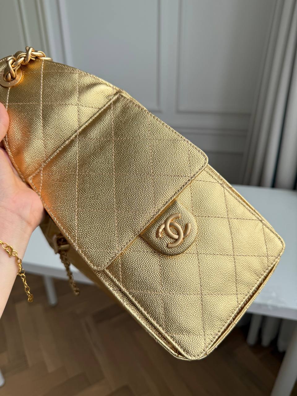 Chanel 25 Mini/Small Metallic Grained Calfskin Bucket Bag in Gold