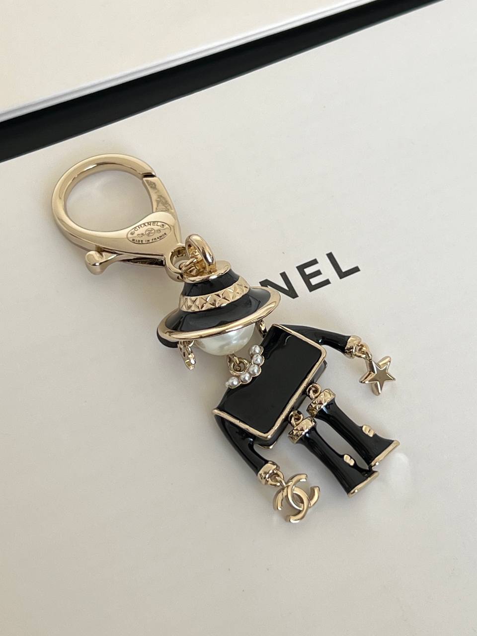 Chanel Doll Pearl Enamel Metal Keychain Bag Charm