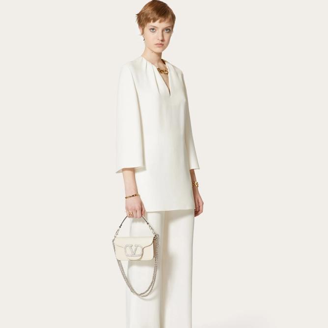 VALENTINO GARAVANI LOCÒ MICRO BAG WITH CHAIN AND JEWEL LOGO