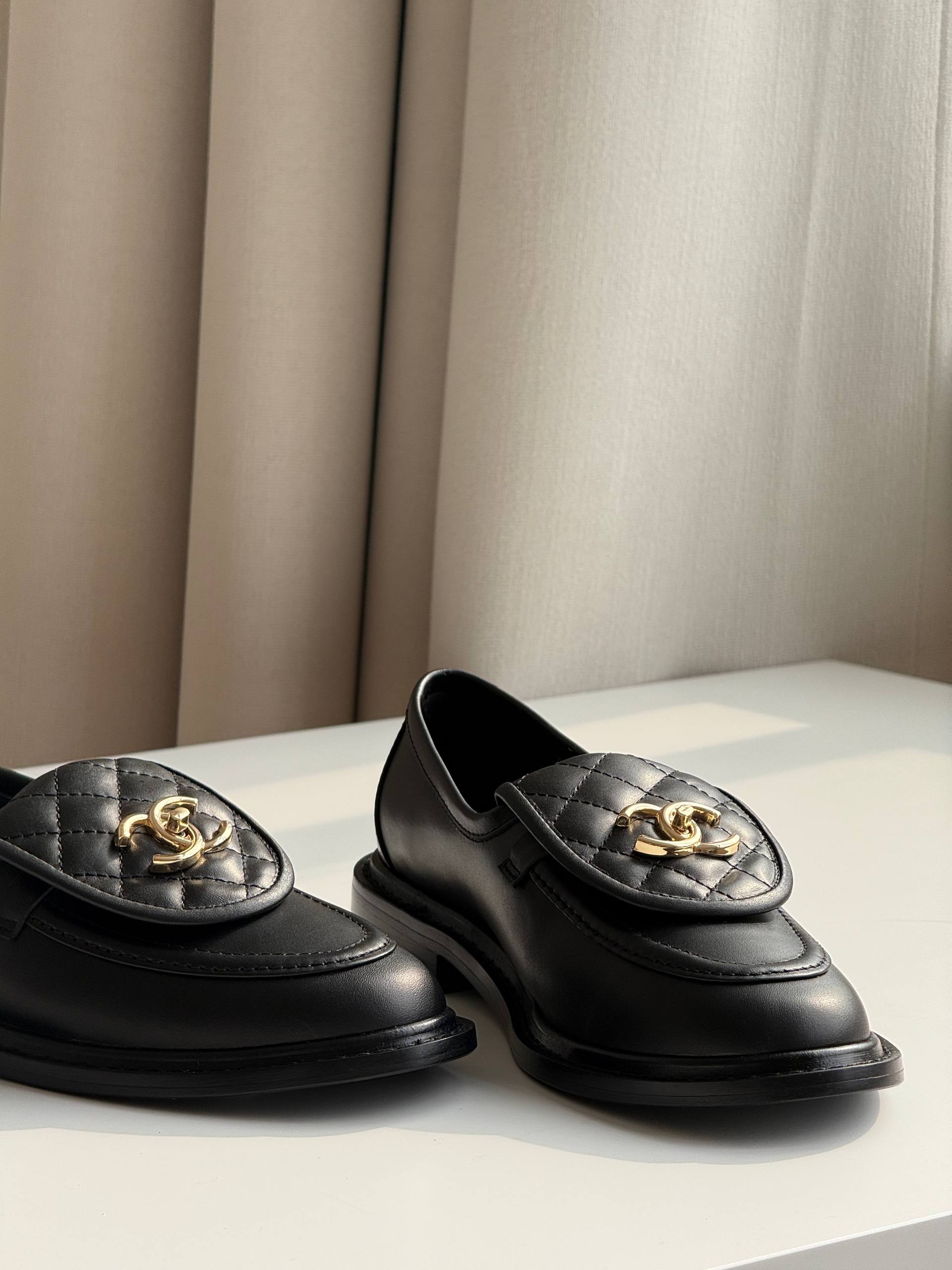 Chanel Quilted CC Turnlock Loafers