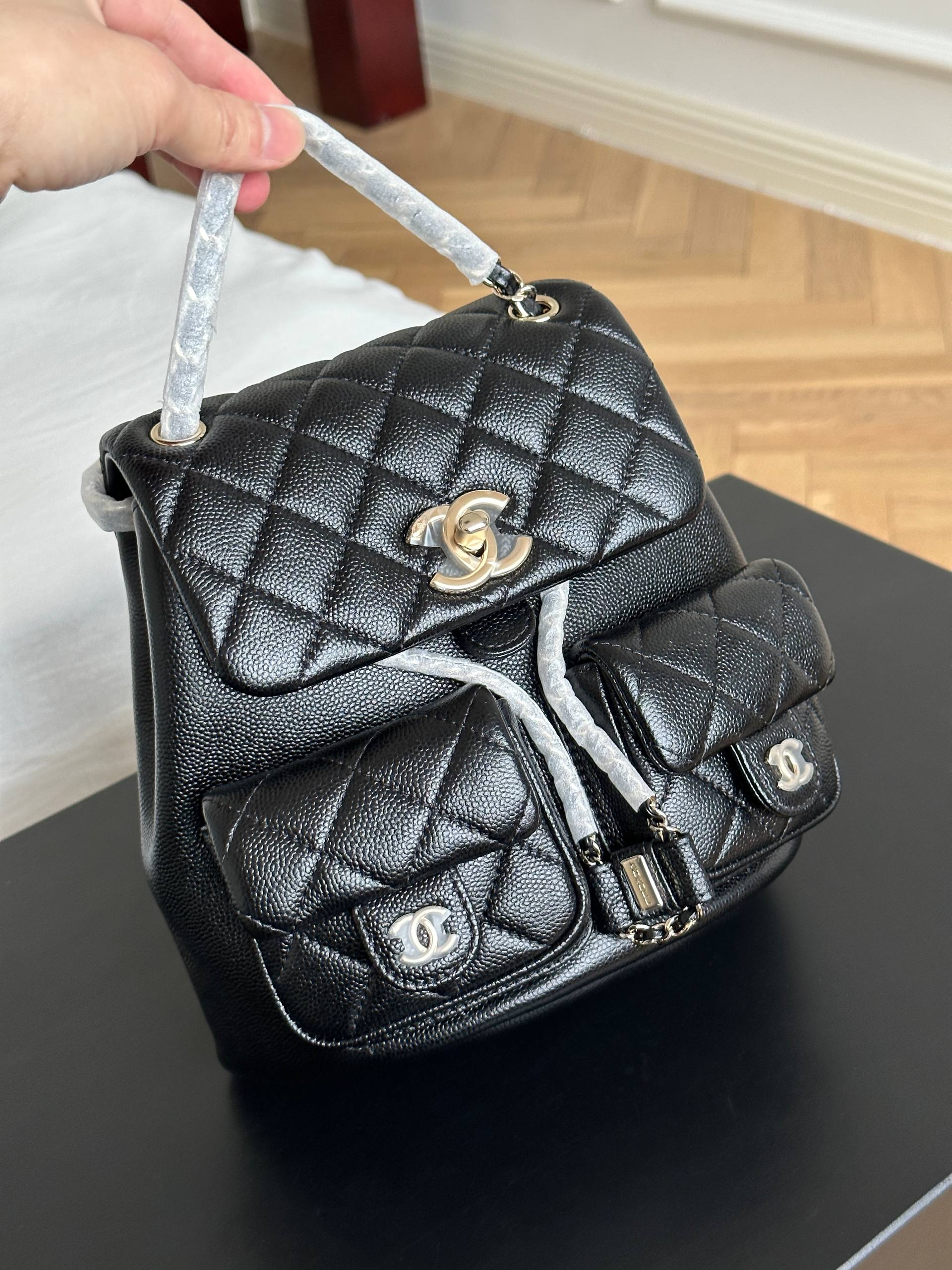 Chanel Black Caviar Quilted Double Pocket CC Drawstring Chain Mini Backpack