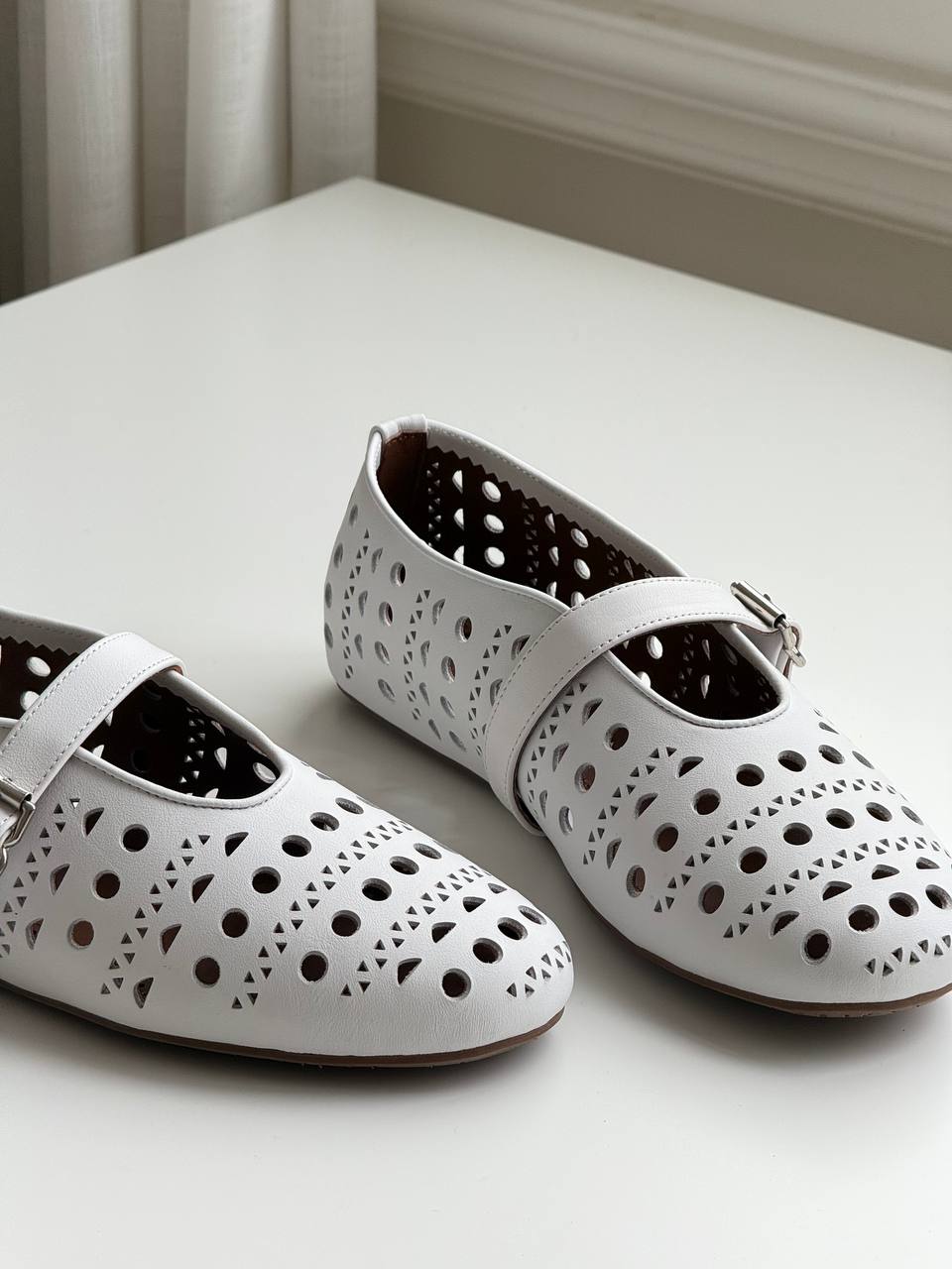 ALAÏA Vienne Laser-Cut Leather Mary Jane Ballerina Flats