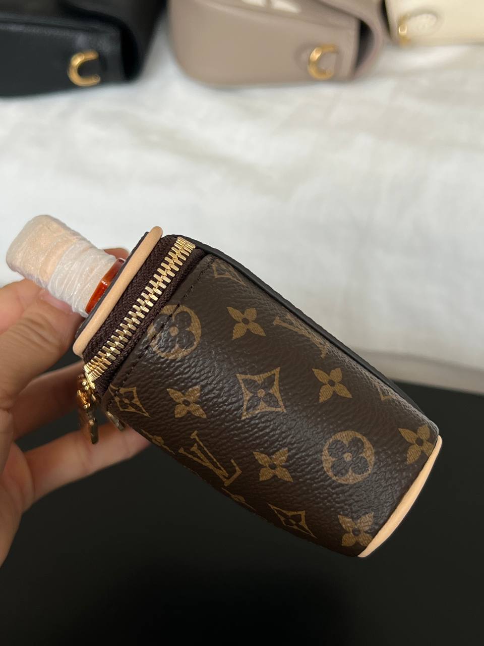 Louis Vuitton Mini Handheld Cosmetic Bag In Classic Monogram Coated Canvas