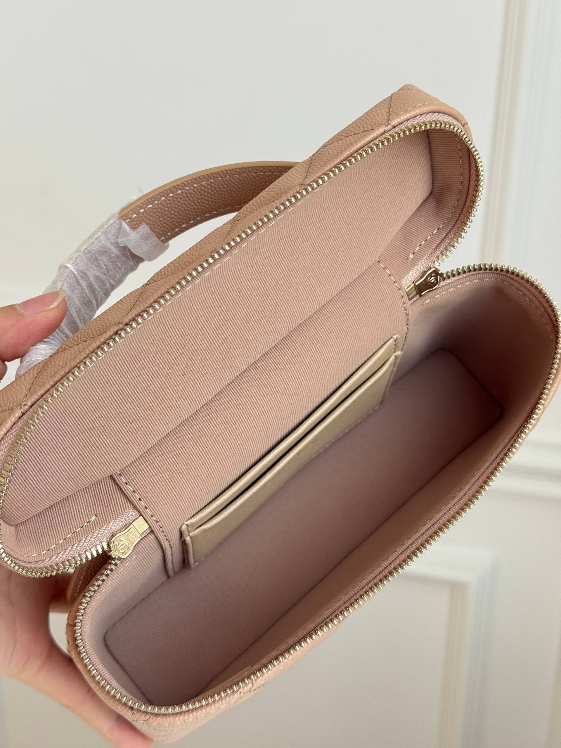 CHANEL Quilted Caviar Leather Long Vanity Case with Top Handle (Nude Beige