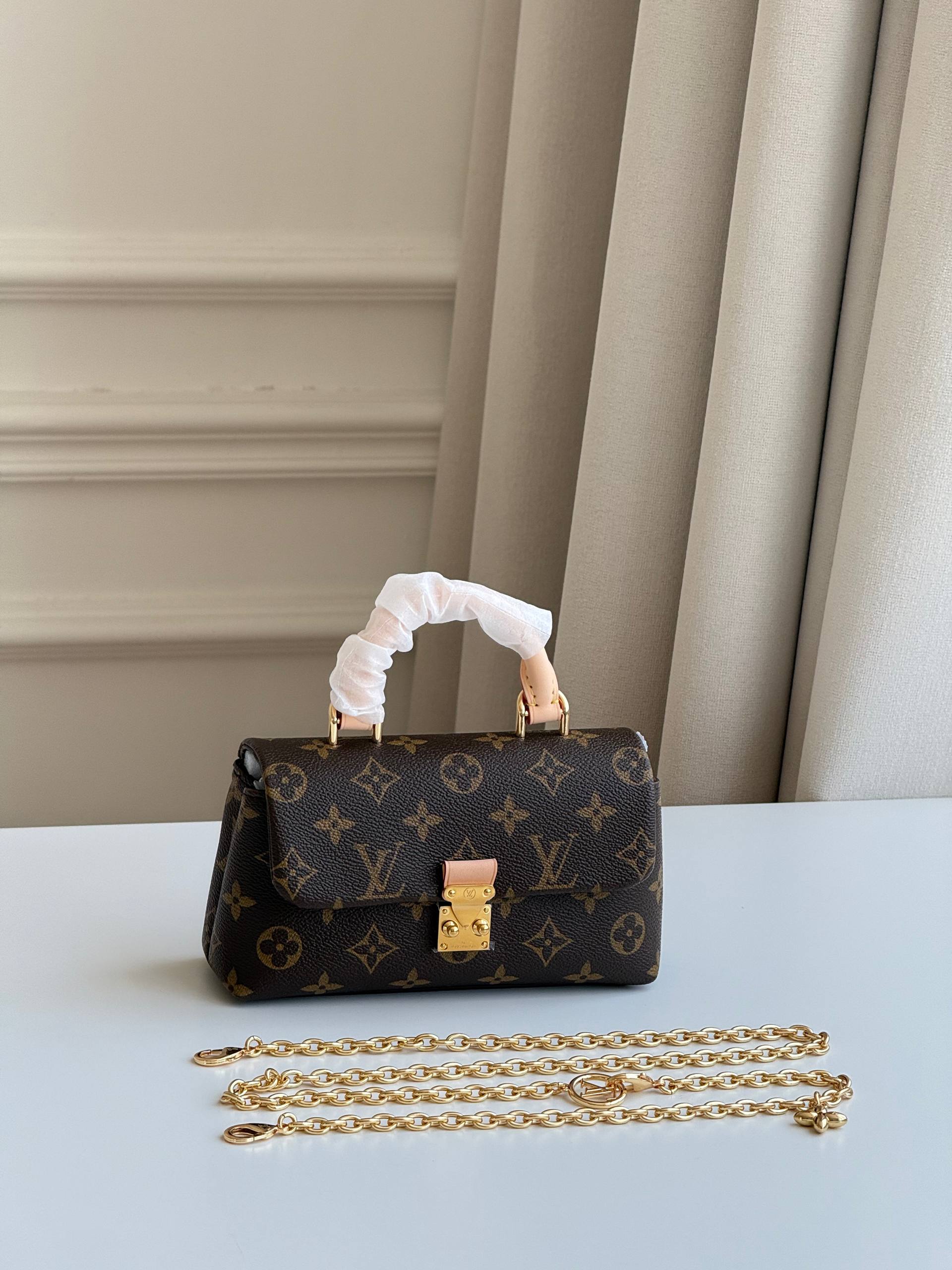 Louis Vuitton Nano Madeleine Monogram Handbag