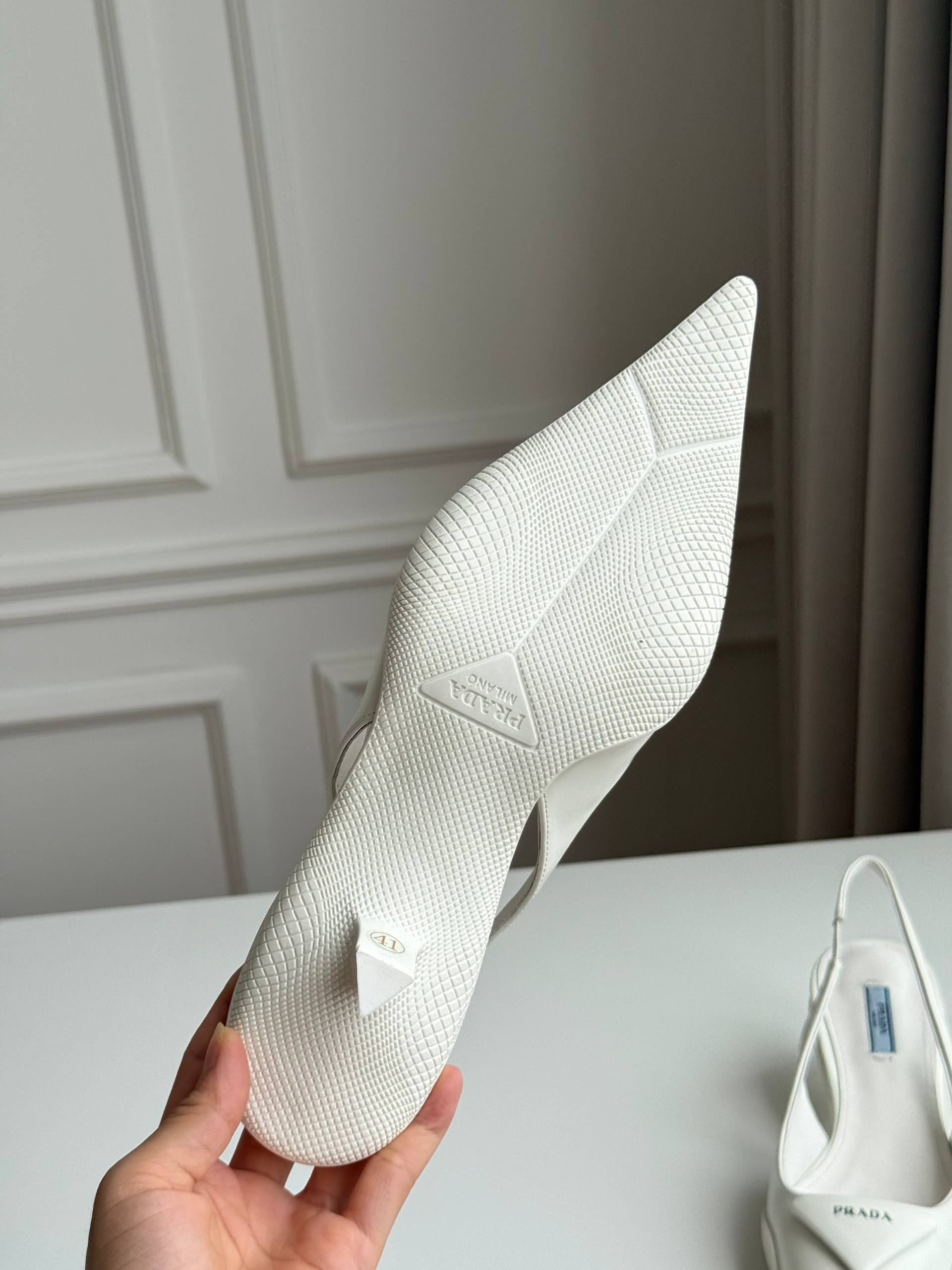 Prada Triangle Logo Slingback Pointed-Toe Kitten Heel Pumps