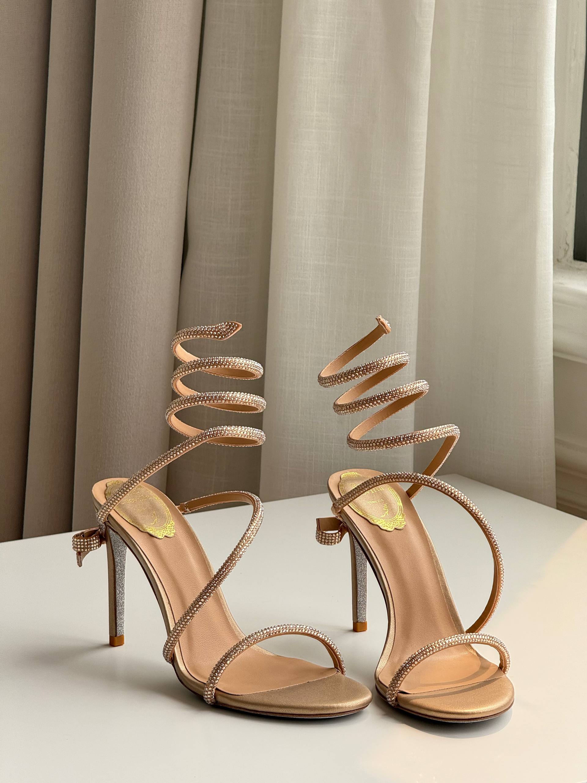 Rene Caovilla Cleo Series Nude Rhinestone Snake Wrap High-Heel Sandals