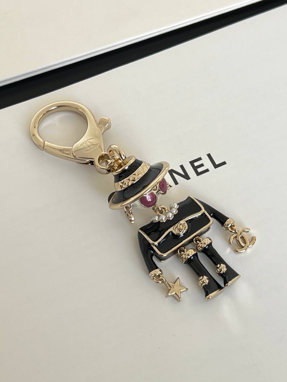 Chanel Doll Pearl Enamel Metal Keychain Bag Charm