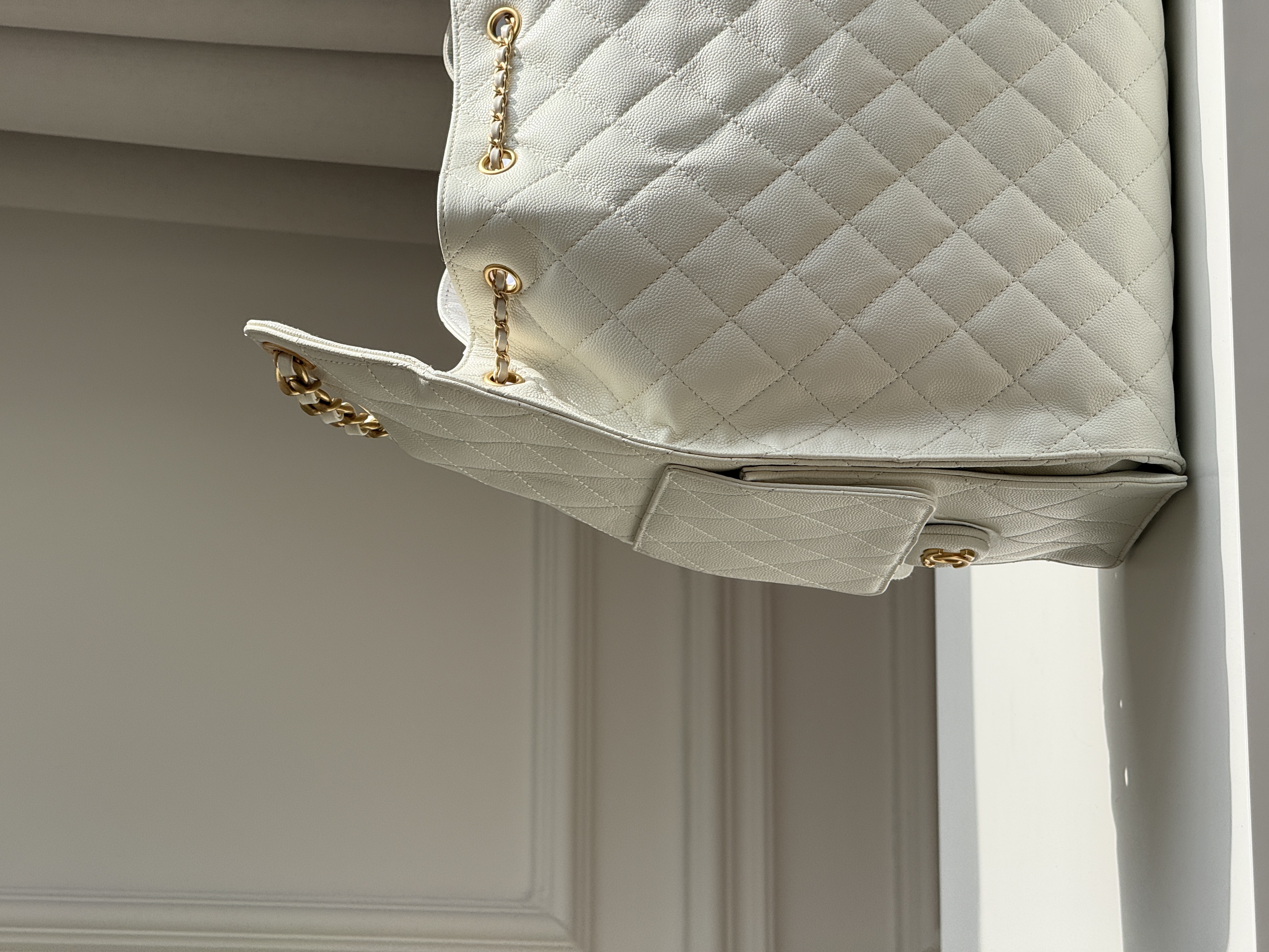 CHANEL Quilted Drawstring Bucket Bag in Milky White