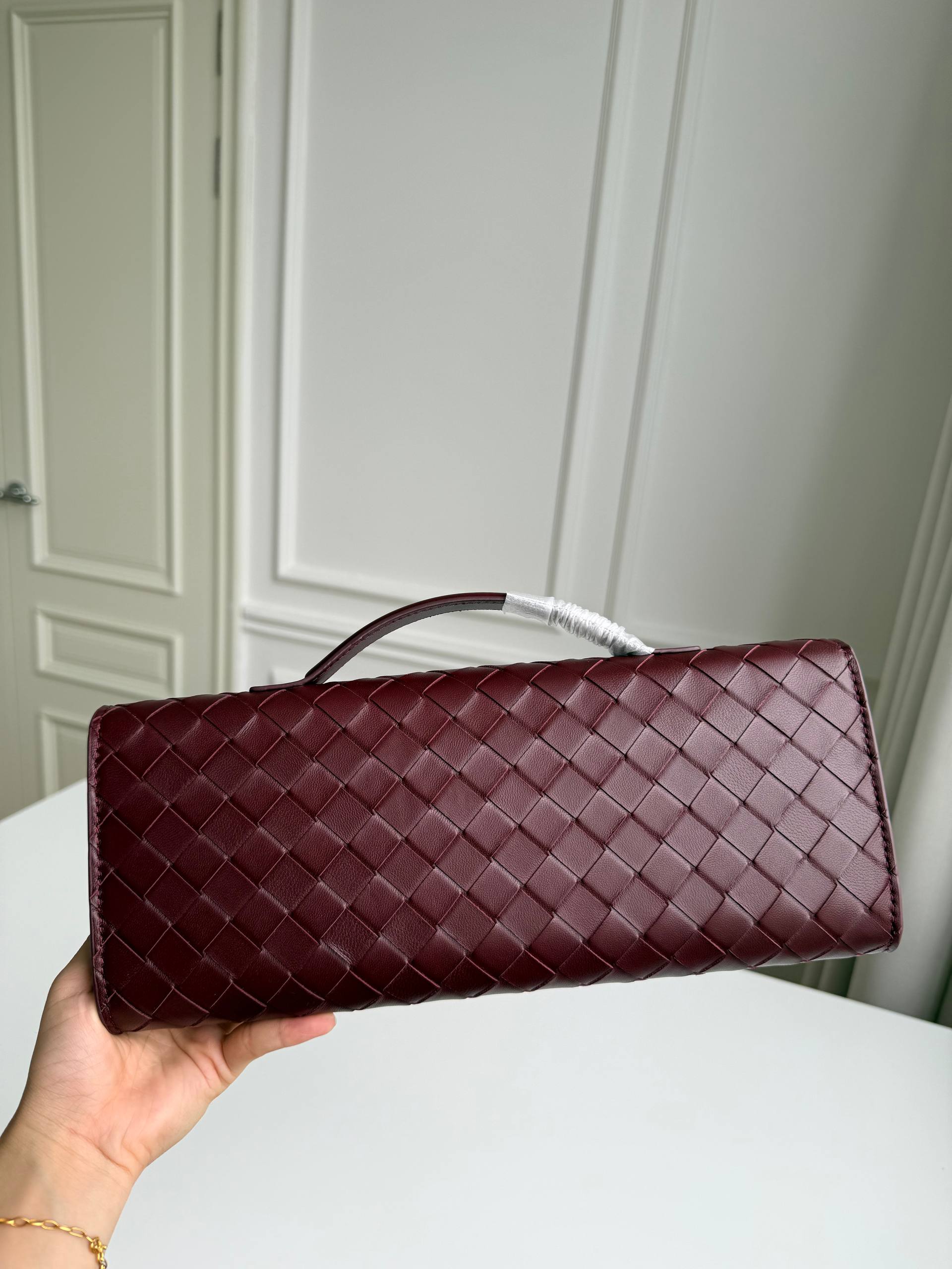 BV Andiamo Woven Leather Clutch Bag