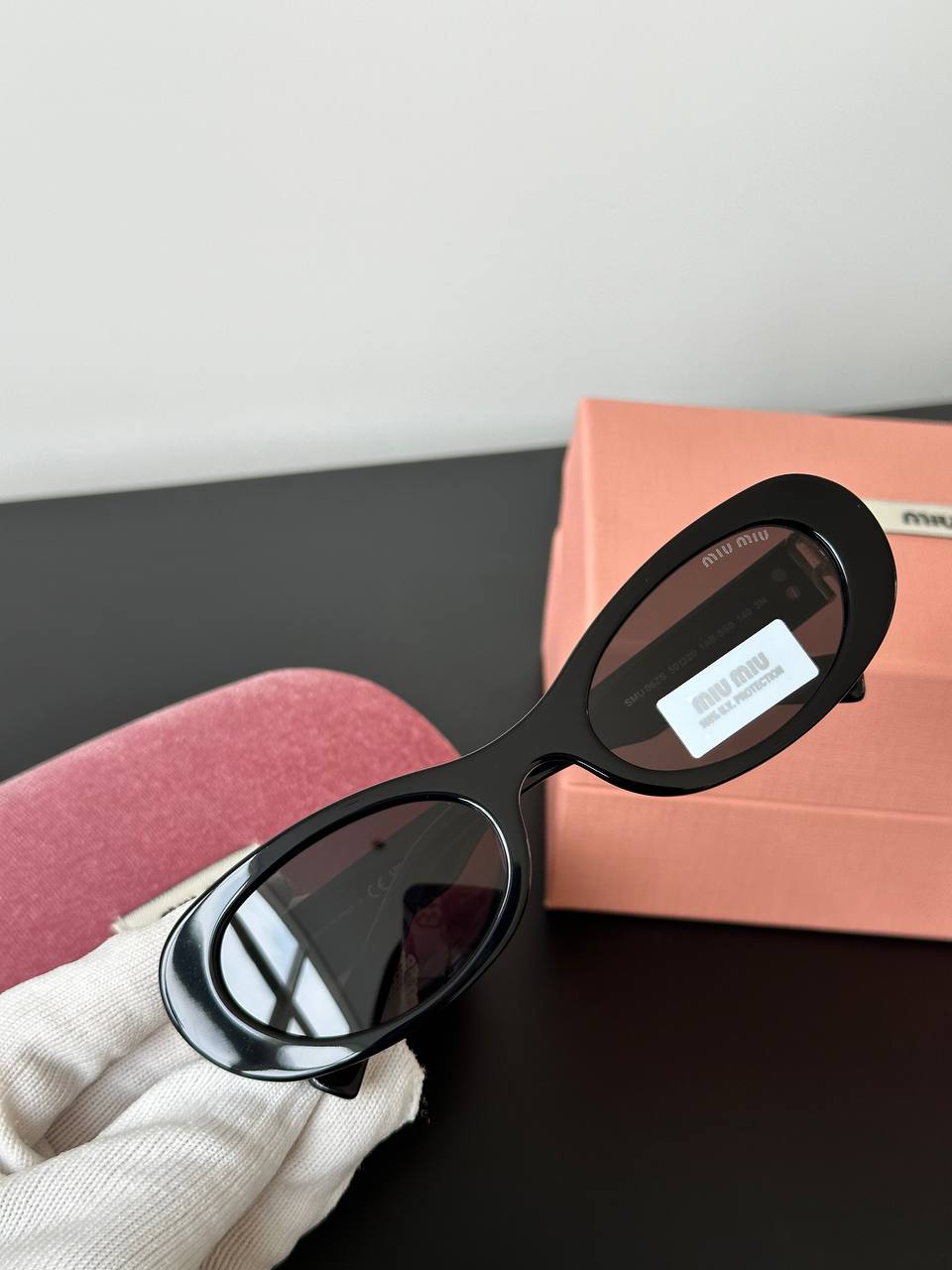 Miu Miu Black Oval Retro Sunglasses